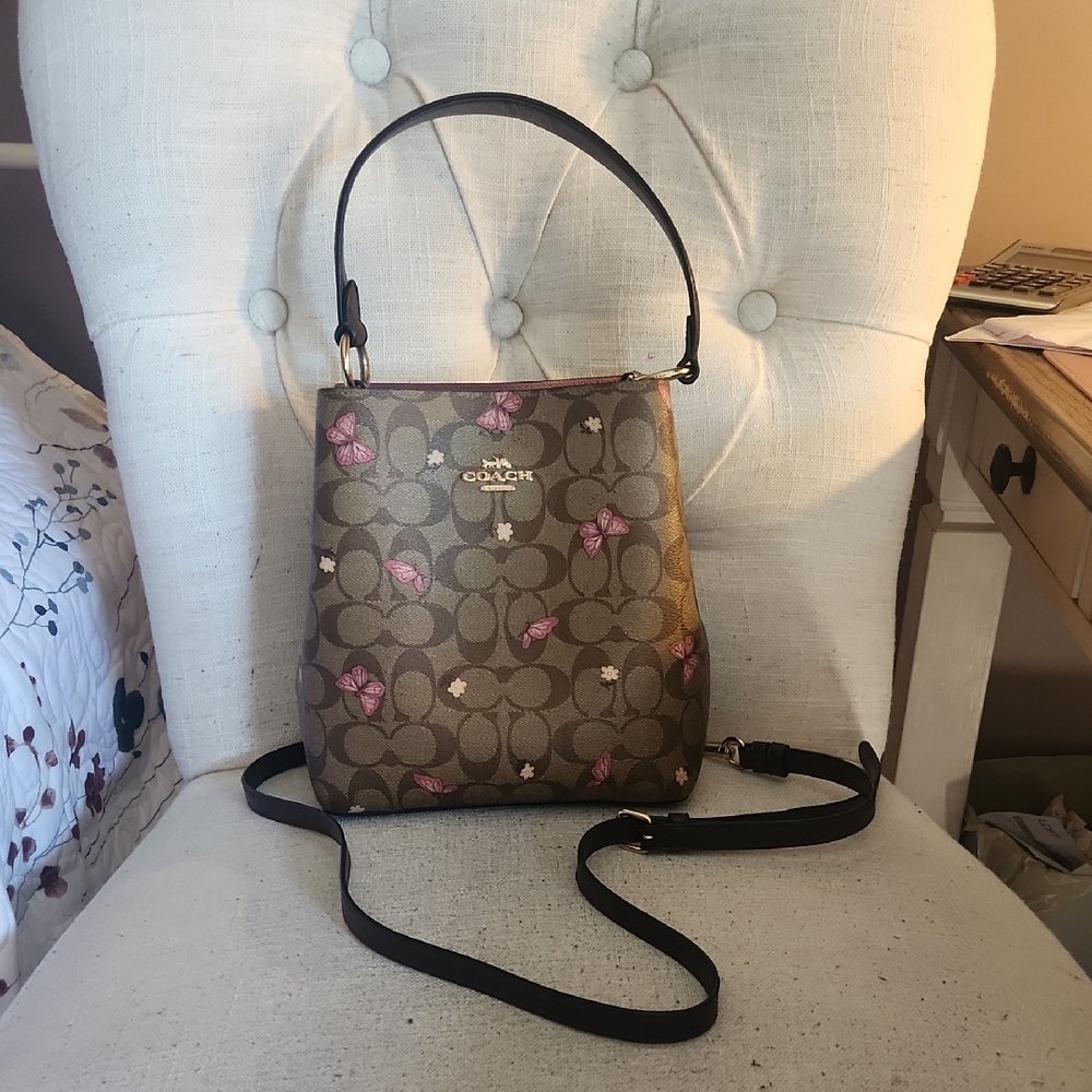Coach Small town bucket bag in signature canvas with butterflies.